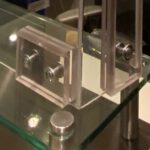 non-damaging foot for mounting sneeze shield