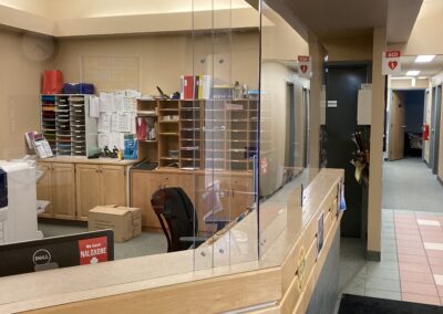 Reception desk sneeze guard barrier custom design and installation